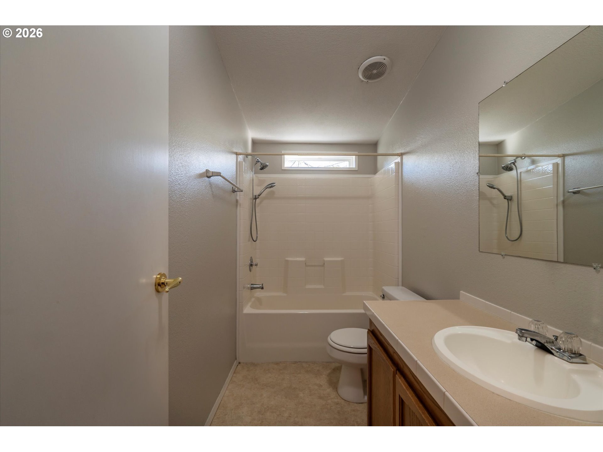 887 Jackson Avenue Southwest Bandon, OR 97411 - Photo 25 of 29 a bathroom with a sink a toilet and shower
