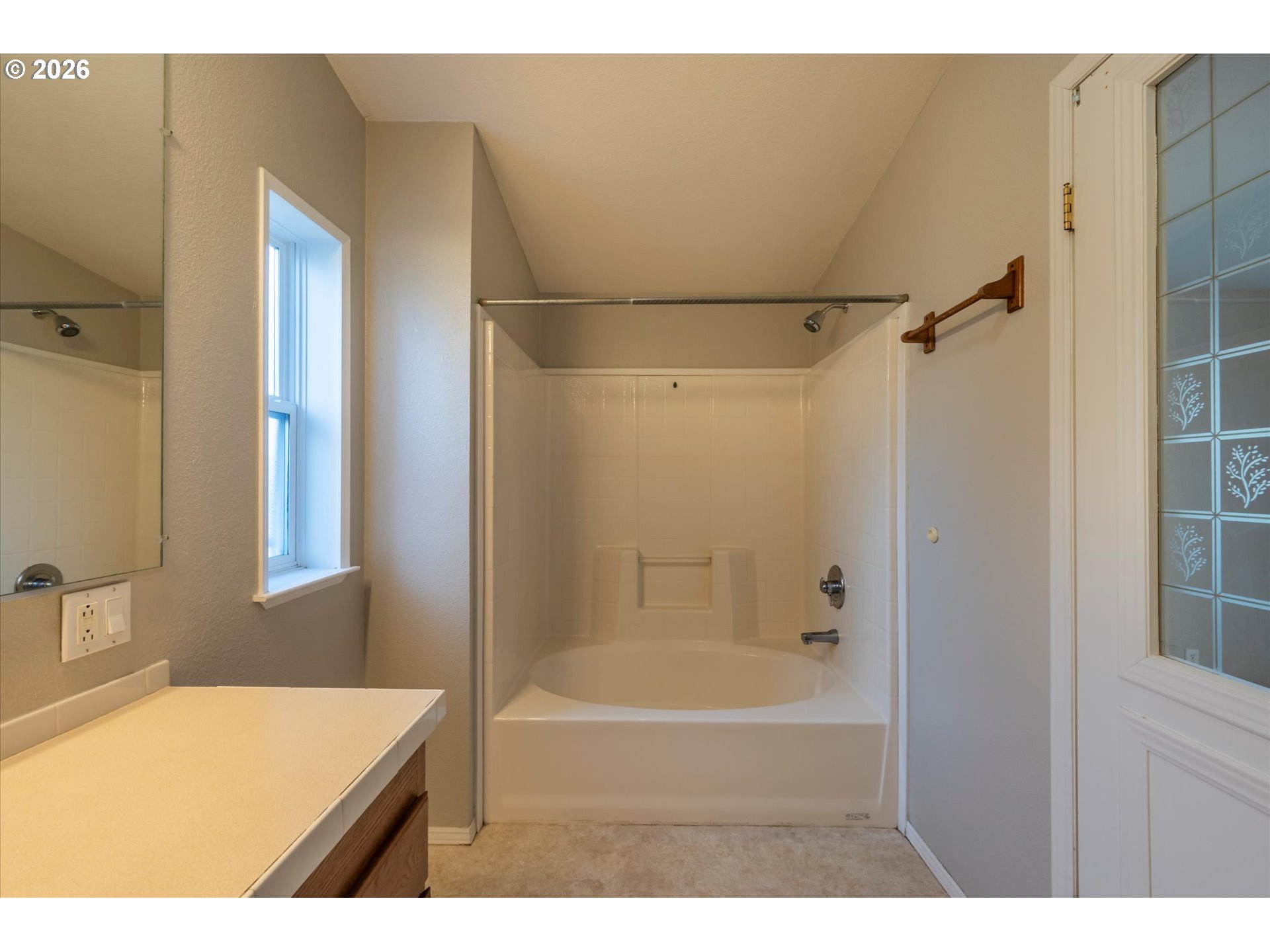 887 Jackson Avenue Southwest Bandon, OR 97411 - Photo 28 of 29 a bathroom with a tub a sink and a shower