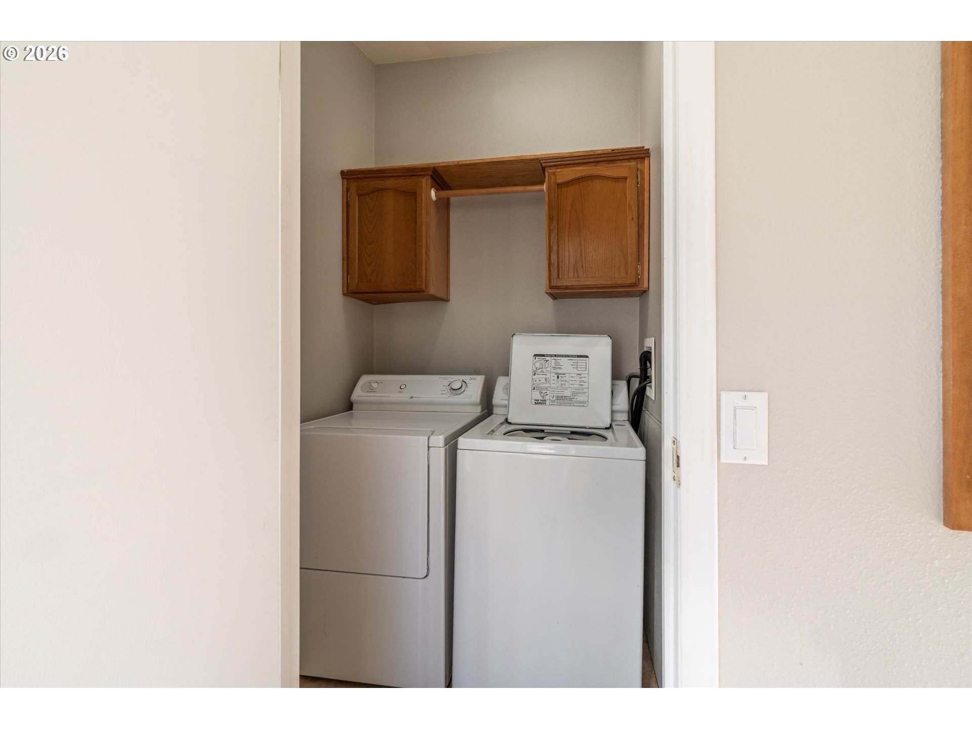 887 Jackson Avenue Southwest Bandon, OR 97411 - Photo 9 of 29 a utility room with dryer and washer
