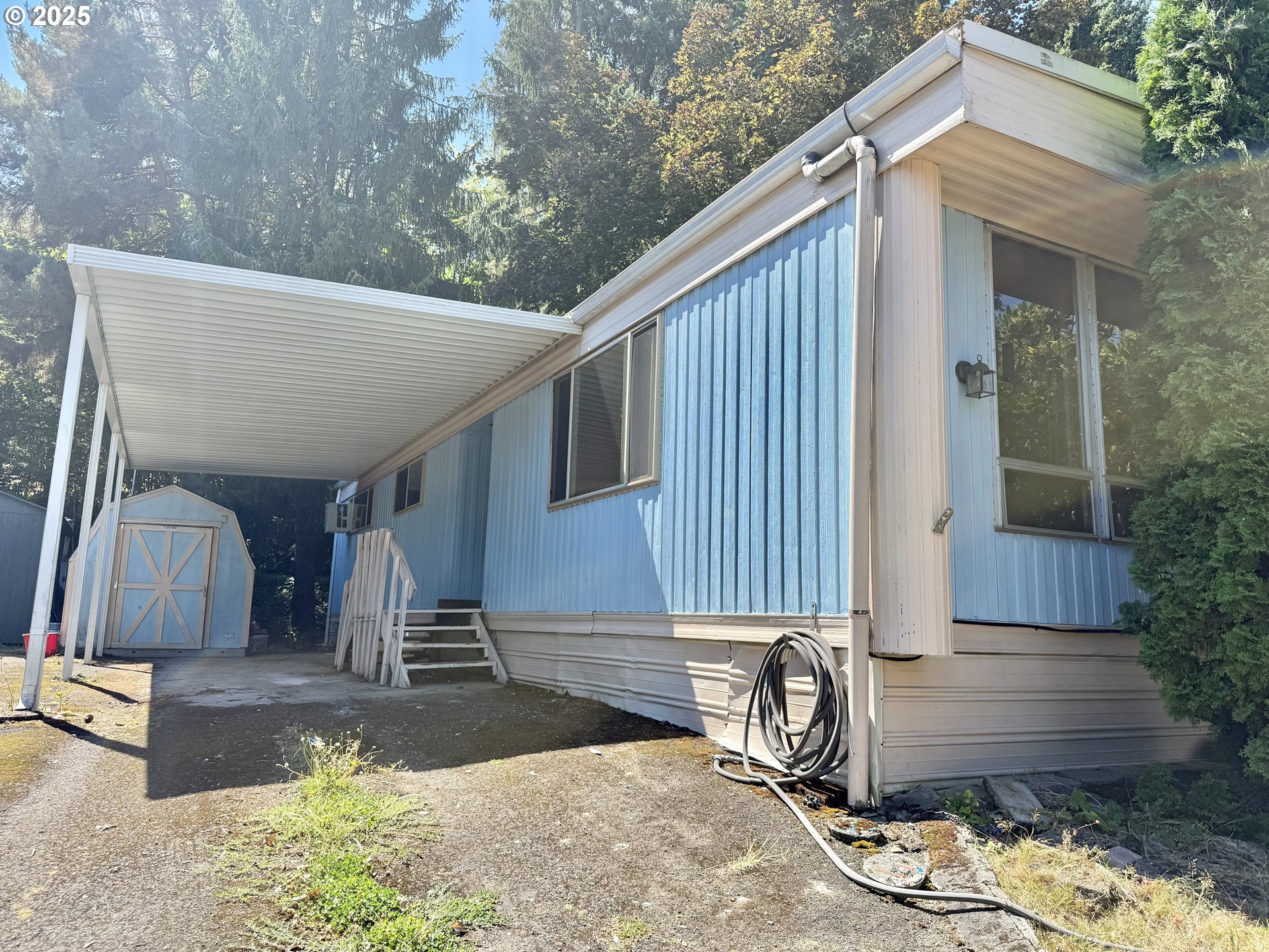 6900 Southwest 195th Avenue Beaverton, OR 97007 - Photo 1 of 21 a front view of a house with garden