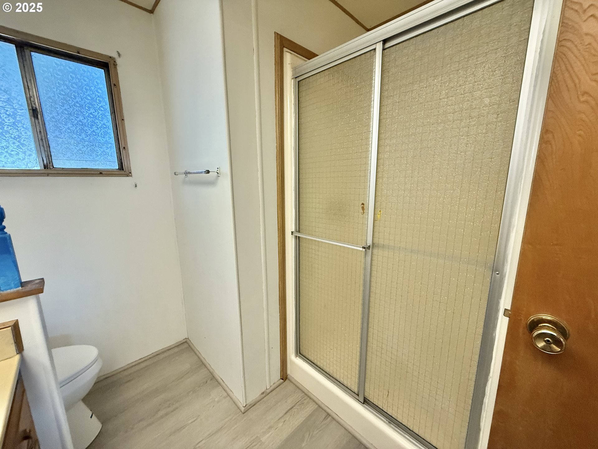 6900 Southwest 195th Avenue Beaverton, OR 97007 - Photo 21 of 21 a bathroom with a shower and a toilet