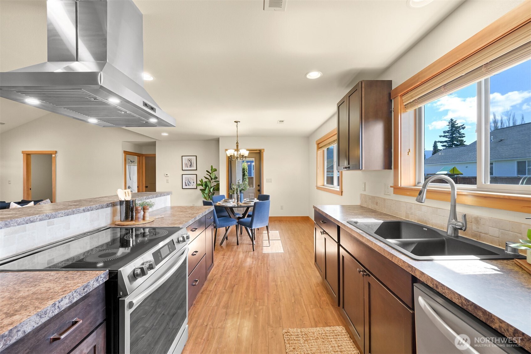 403 Westview Place Nooksack, WA 98276 - Photo 12 of 28 a kitchen with sink stove and cabinets