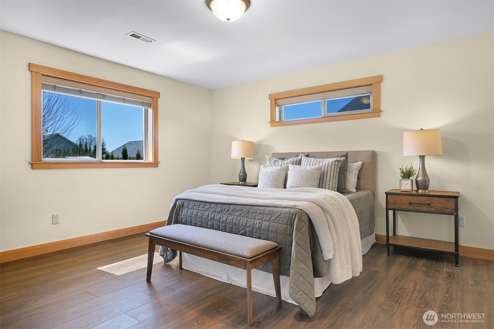 403 Westview Place Nooksack, WA 98276 - Photo 15 of 28 a bedroom with a bed and a lamp