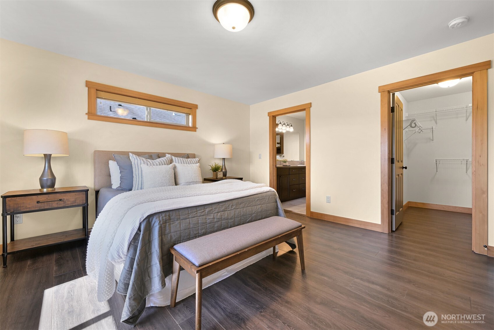 403 Westview Place Nooksack, WA 98276 - Photo 16 of 28 a bedroom with a bed and wooden floor