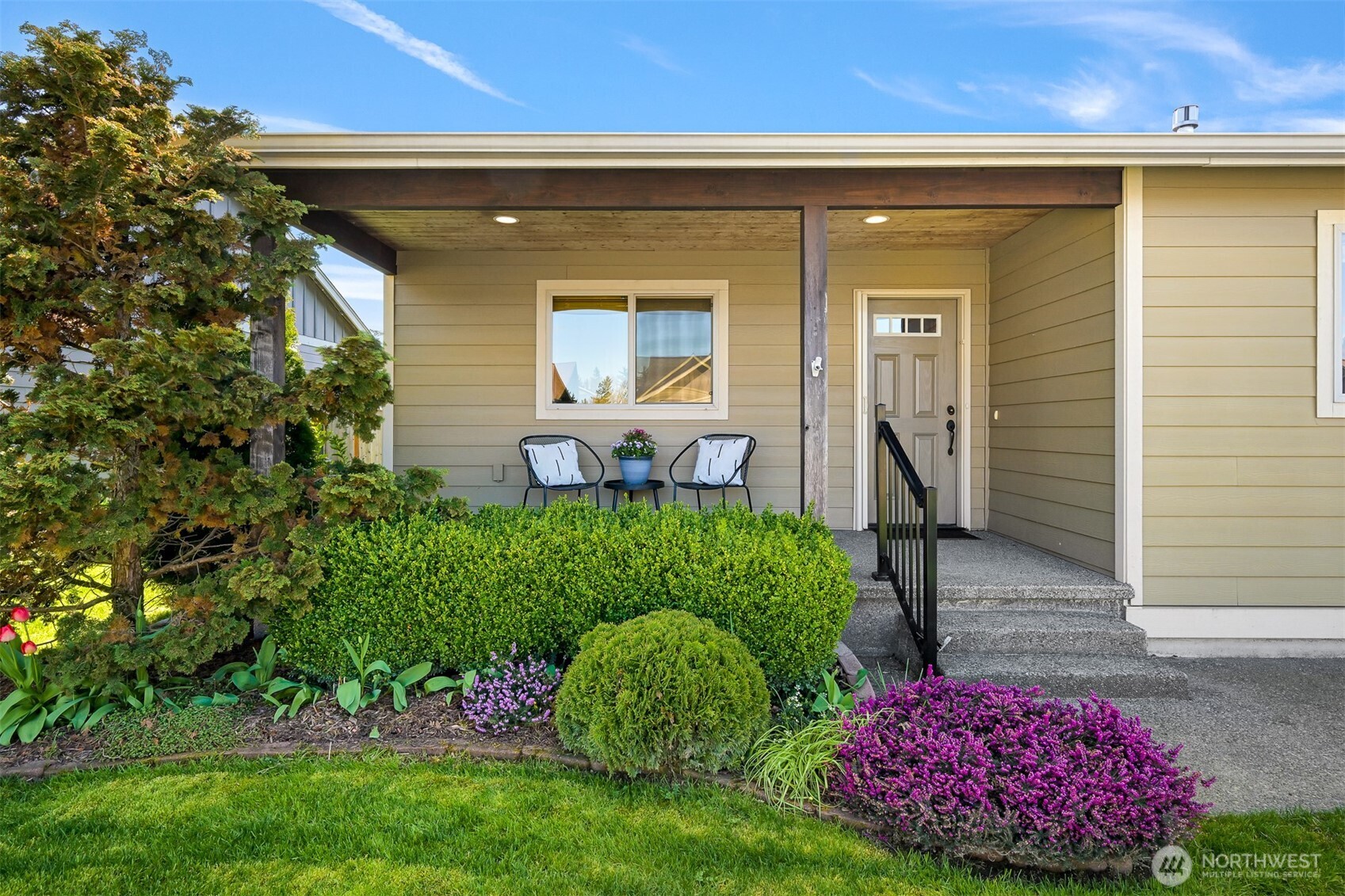 403 Westview Place Nooksack, WA 98276 - Photo 2 of 28 a front view of a house with garden