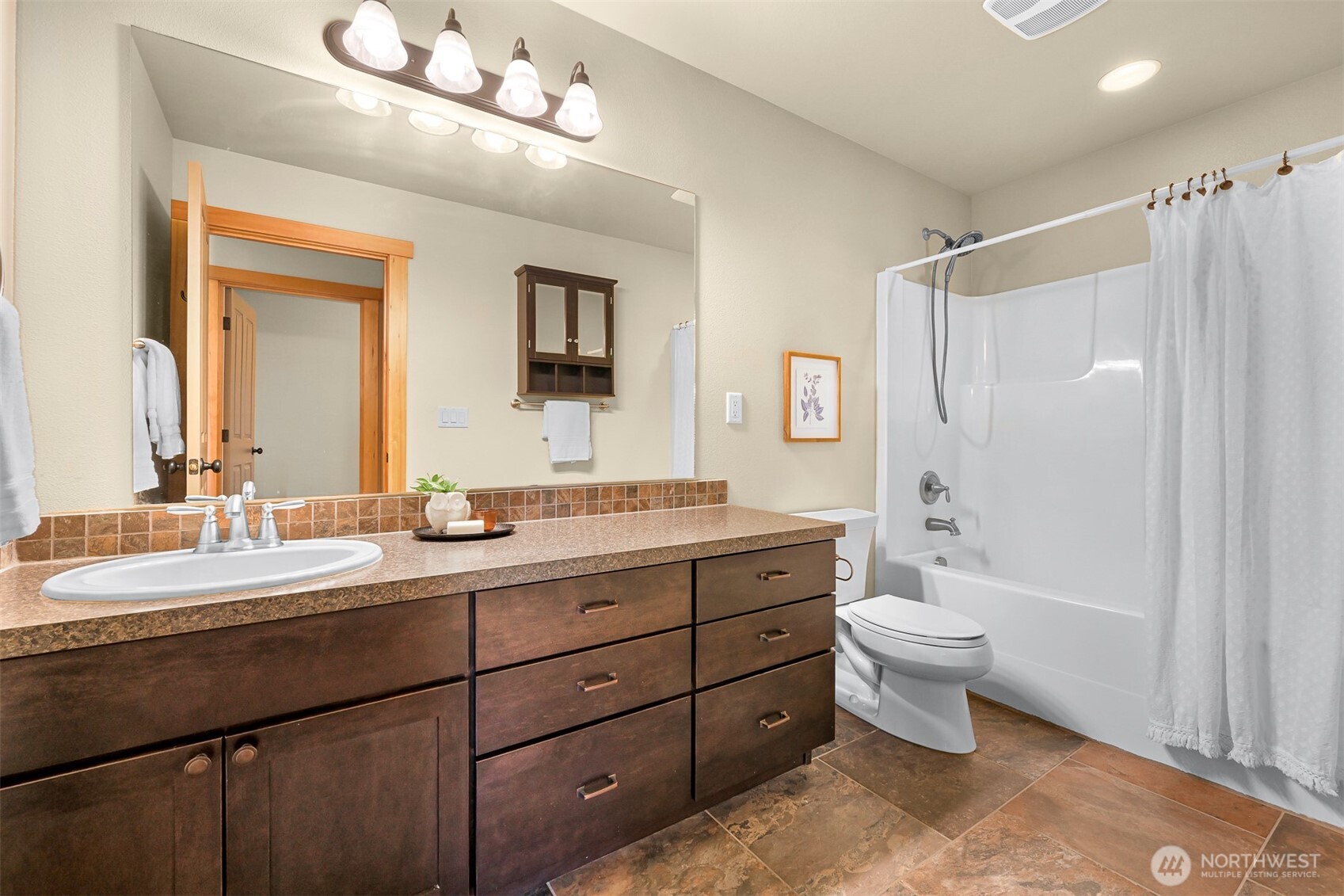 403 Westview Place Nooksack, WA 98276 - Photo 22 of 28 a spacious bathroom with a double vanity sink mirror and toilet