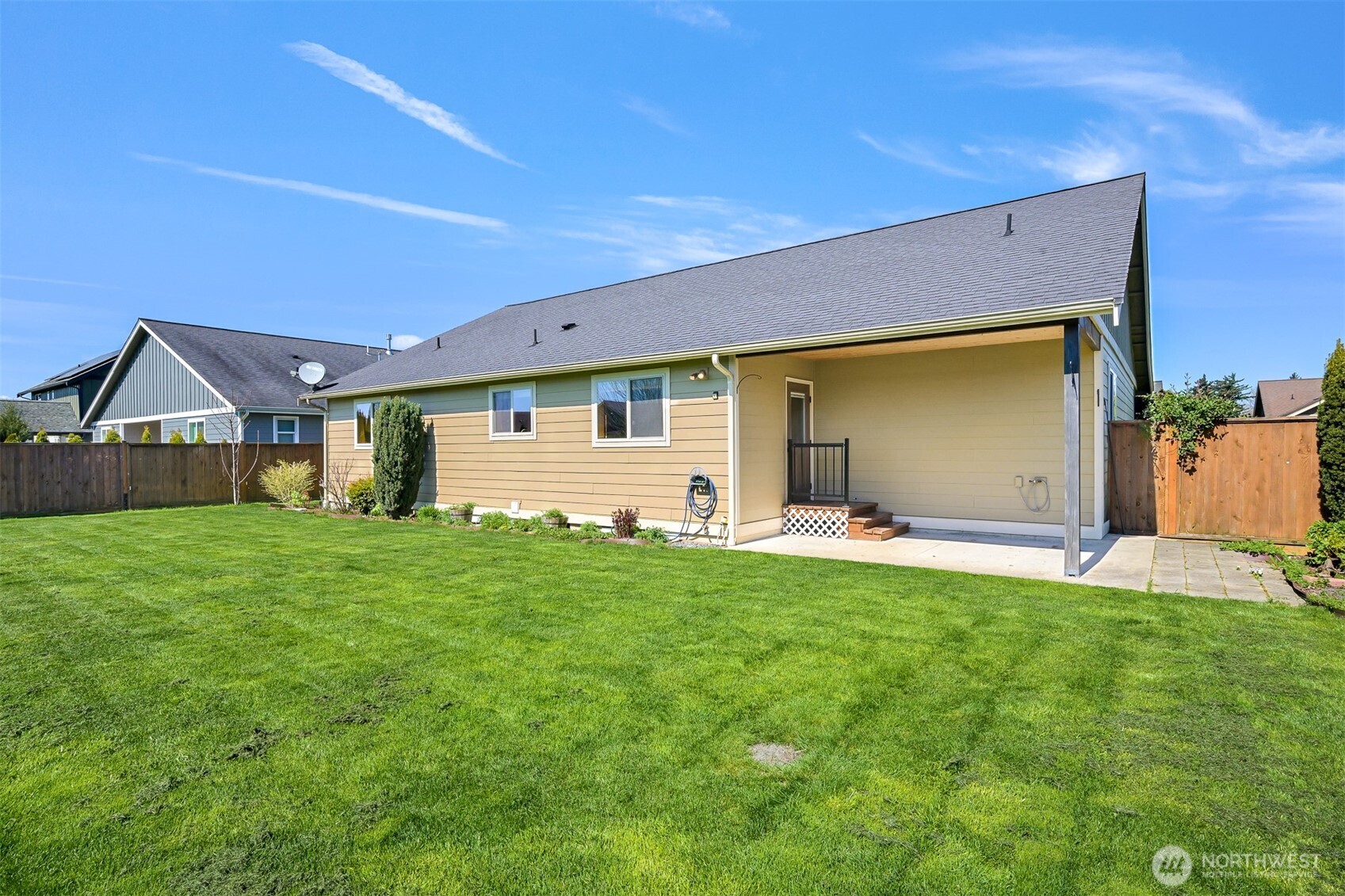403 Westview Place Nooksack, WA 98276 - Photo 24 of 28 a front view of a house with a yard and garage