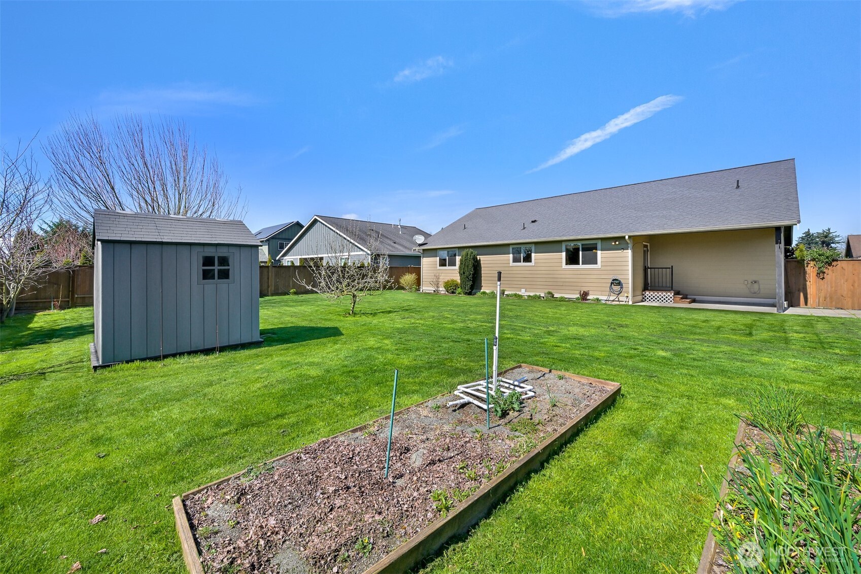 403 Westview Place Nooksack, WA 98276 - Photo 28 of 28 a view of a house with backyard and a garden