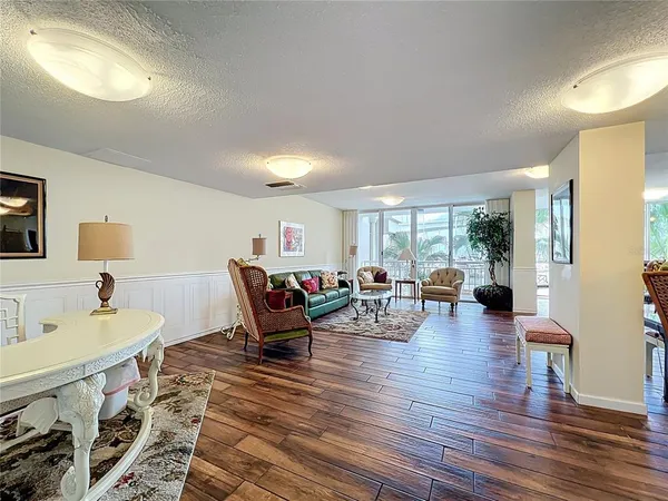 a view of a swimming pool with a table and chairs