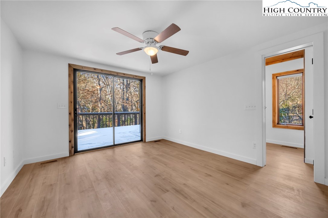 208 Meadow Loop Newland, NC 28657 - Photo 13 of 46 a view of an empty room with a window