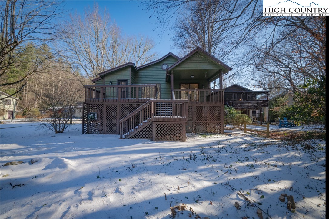 208 Meadow Loop Newland, NC 28657 - Photo 39 of 46 a front view of a house with a yard