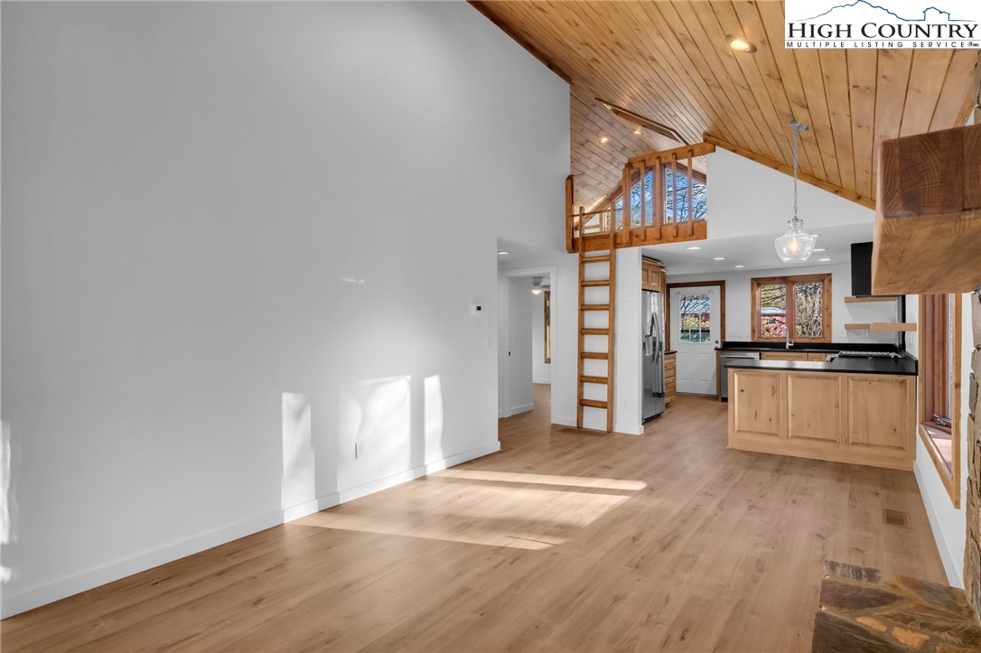 208 Meadow Loop Newland, NC 28657 - Photo 9 of 46 a view of a kitchen with a sink and cabinets