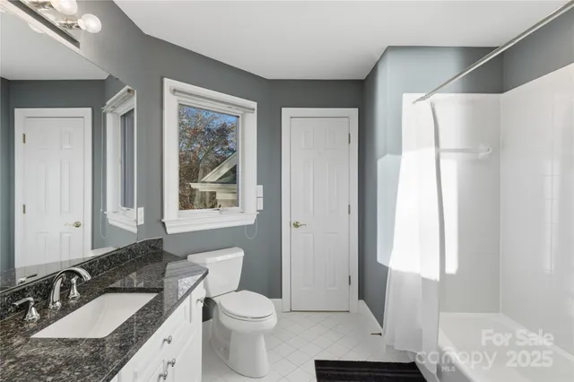 an empty room with ceiling fan and ceiling fan