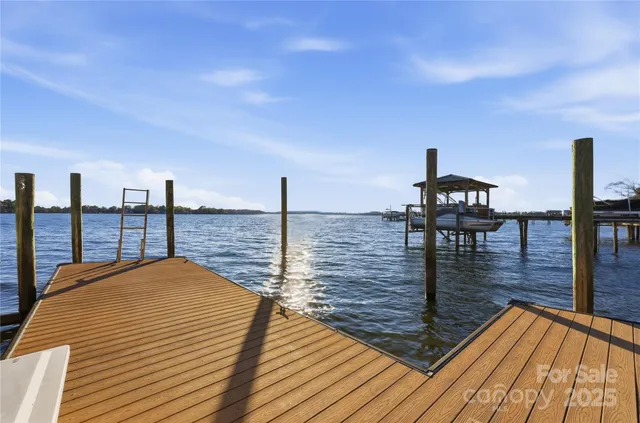 a view of balcony and deck with wooden floor
