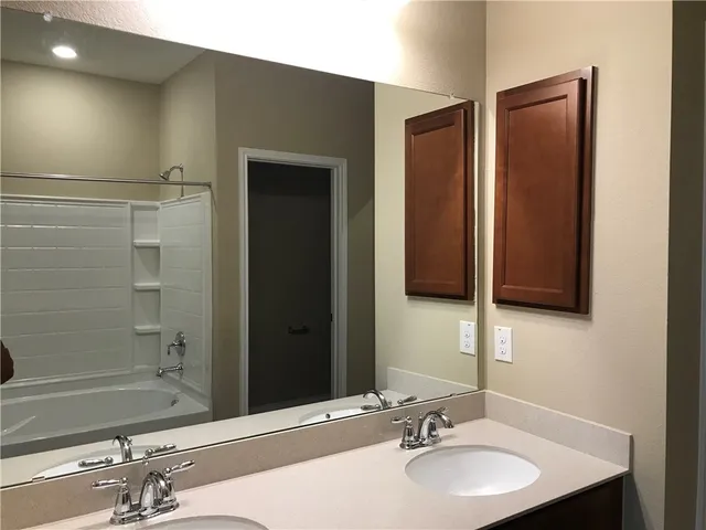 a view of kitchen with wooden floor