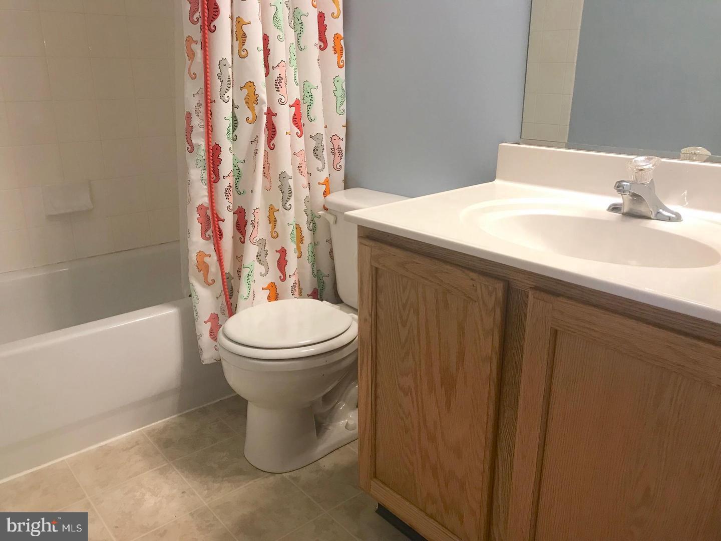 3004 Raking Leaf Drive Abingdon, MD 21009 - Photo 11 of 15 a bathroom with a sink toilet and shower