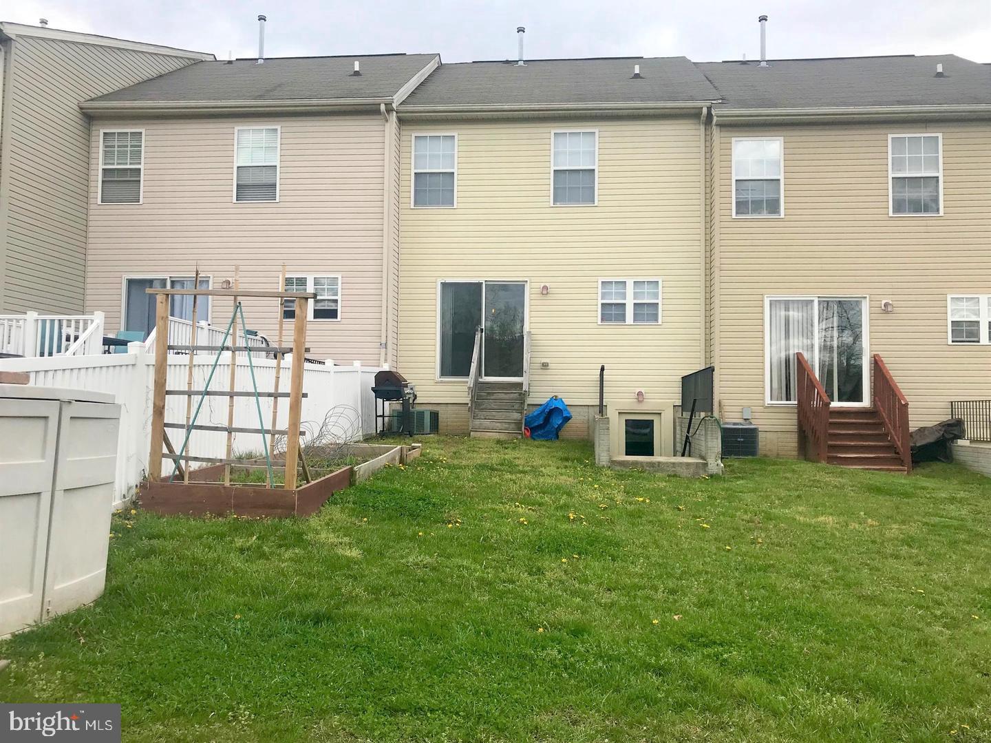 3004 Raking Leaf Drive Abingdon, MD 21009 - Photo 14 of 15 a front view of a house with a yard