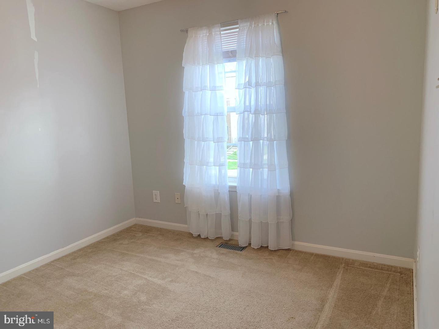 3004 Raking Leaf Drive Abingdon, MD 21009 - Photo 9 of 15 an empty room with windows