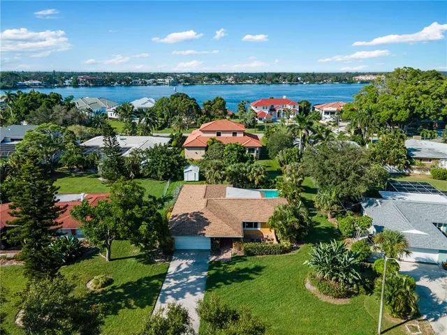 an aerial view of a house with a garden