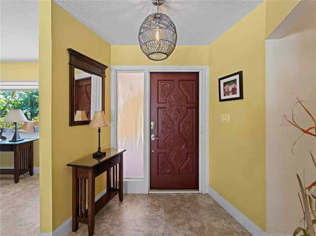 an aerial view of a house with a garden