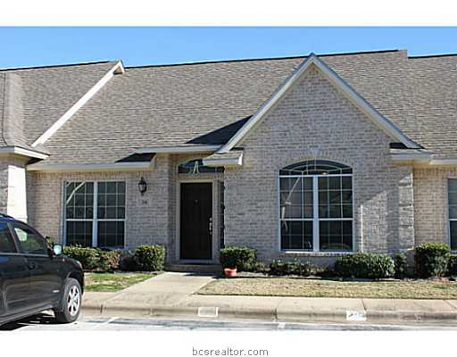 214 Fraternity Row College Station, TX 77845 - Photo 1 of 1 a front view of a house with a yard