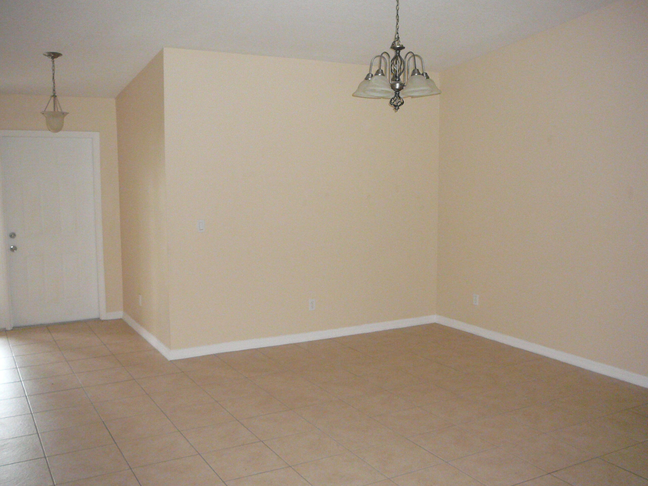 6512 Las Palmas Way Port St. Lucie, FL 34952 - Photo 26 of 45 a view of small space with racks on the wall