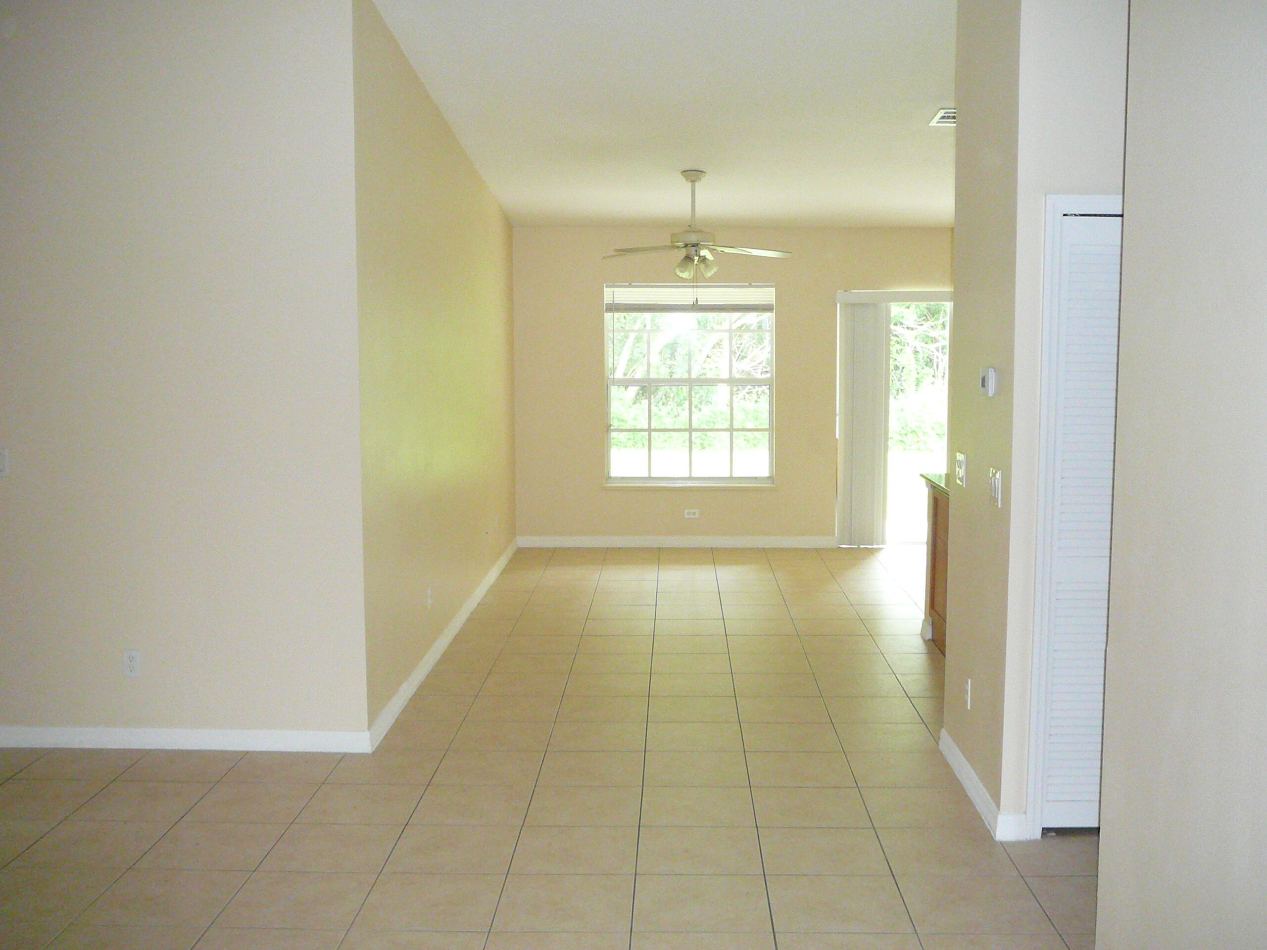 6512 Las Palmas Way Port St. Lucie, FL 34952 - Photo 28 of 45 a view of an empty room with a window