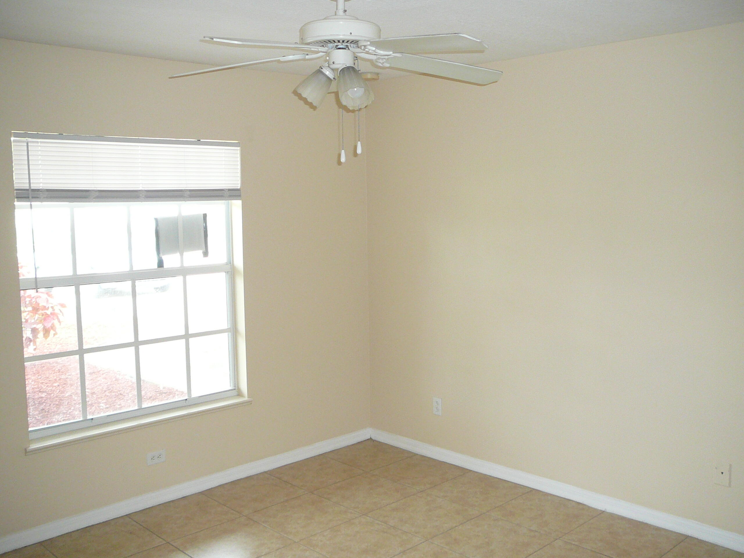 6512 Las Palmas Way Port St. Lucie, FL 34952 - Photo 37 of 45 an empty room with a window