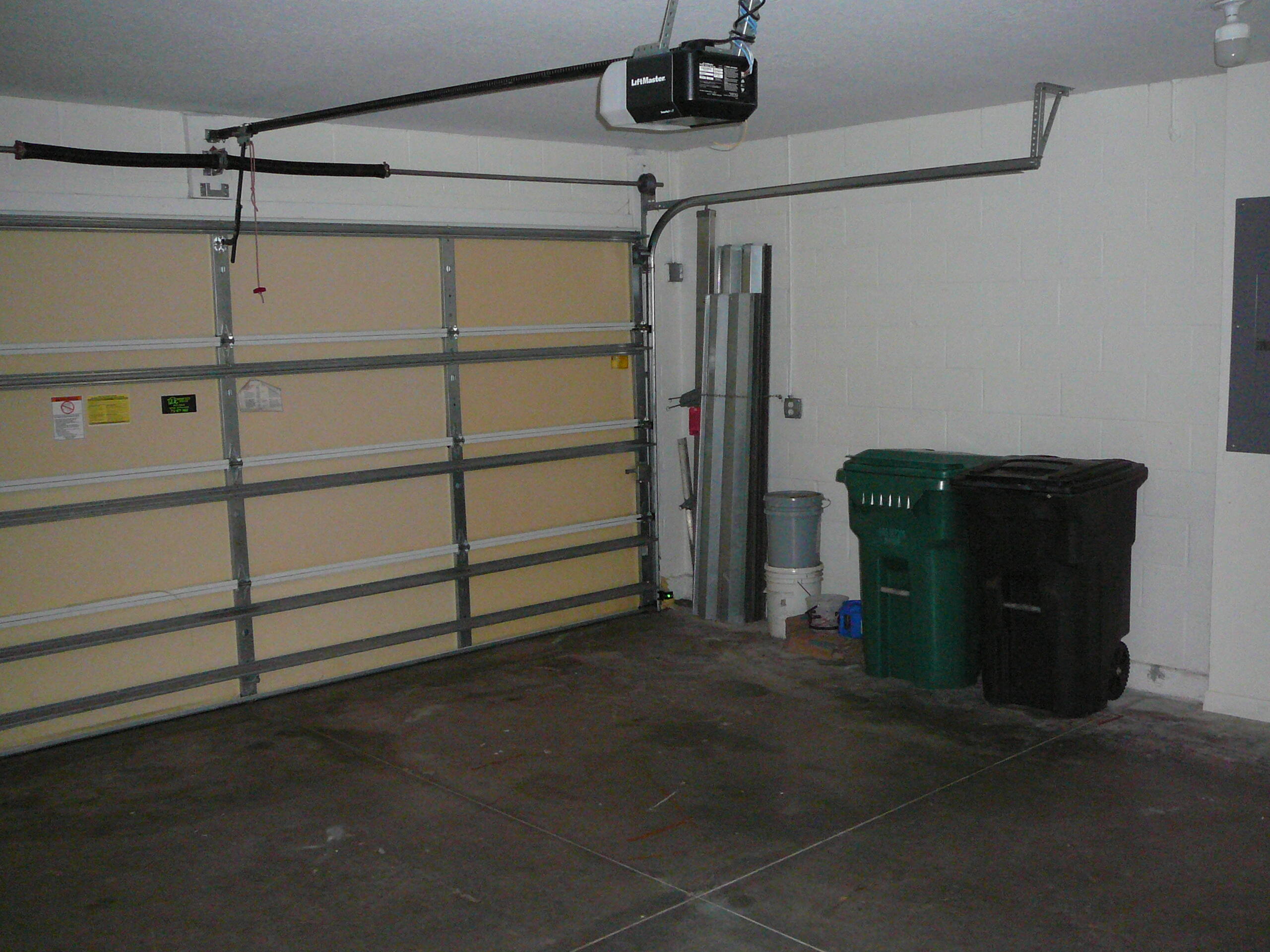 6512 Las Palmas Way Port St. Lucie, FL 34952 - Photo 45 of 45 a view of a storage & utility room with closet dryer and washer