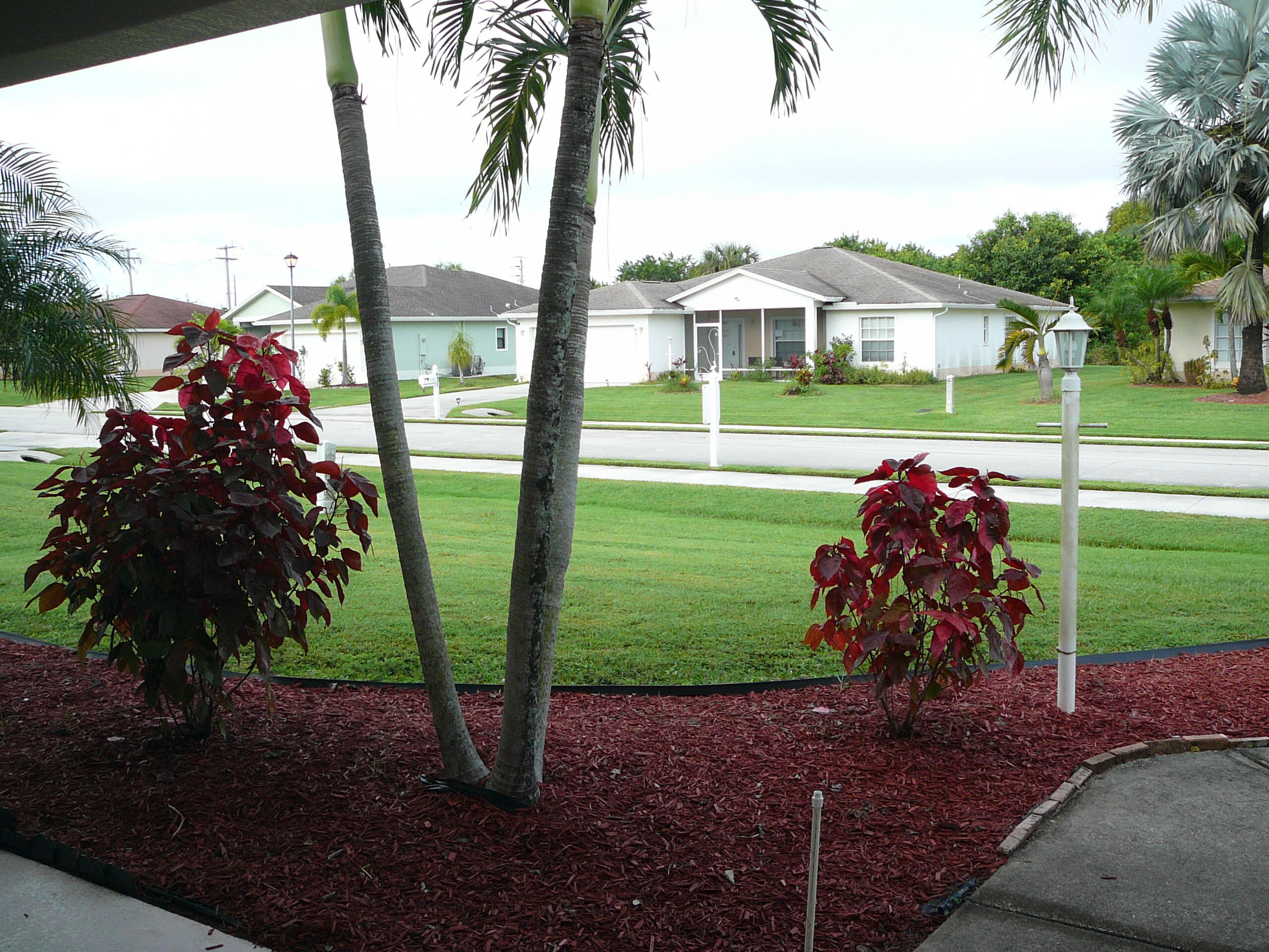 6512 Las Palmas Way Port St. Lucie, FL 34952 - Photo 6 of 45 a view of a backyard