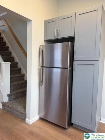 a view of entryway with wooden floor