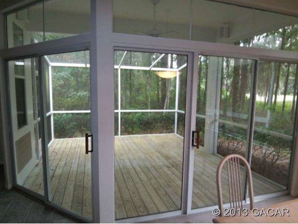 10166 Southwest 52nd Road Gainesville, FL 32608 - Photo 15 of 17 Screened Lanai