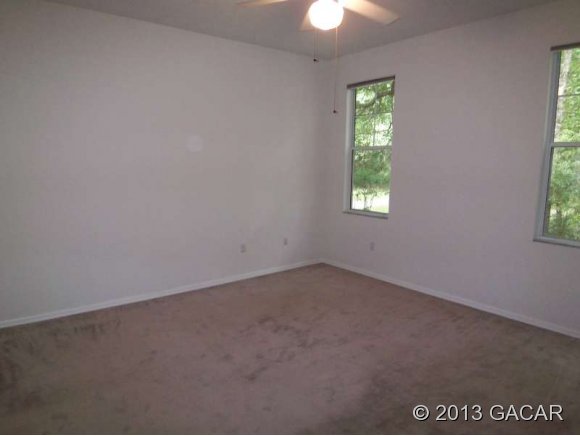 10166 Southwest 52nd Road Gainesville, FL 32608 - Photo 6 of 17 Master Bedroom