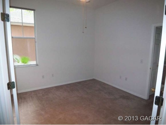 10166 Southwest 52nd Road Gainesville, FL 32608 - Photo 10 of 17 Second Bedroom
