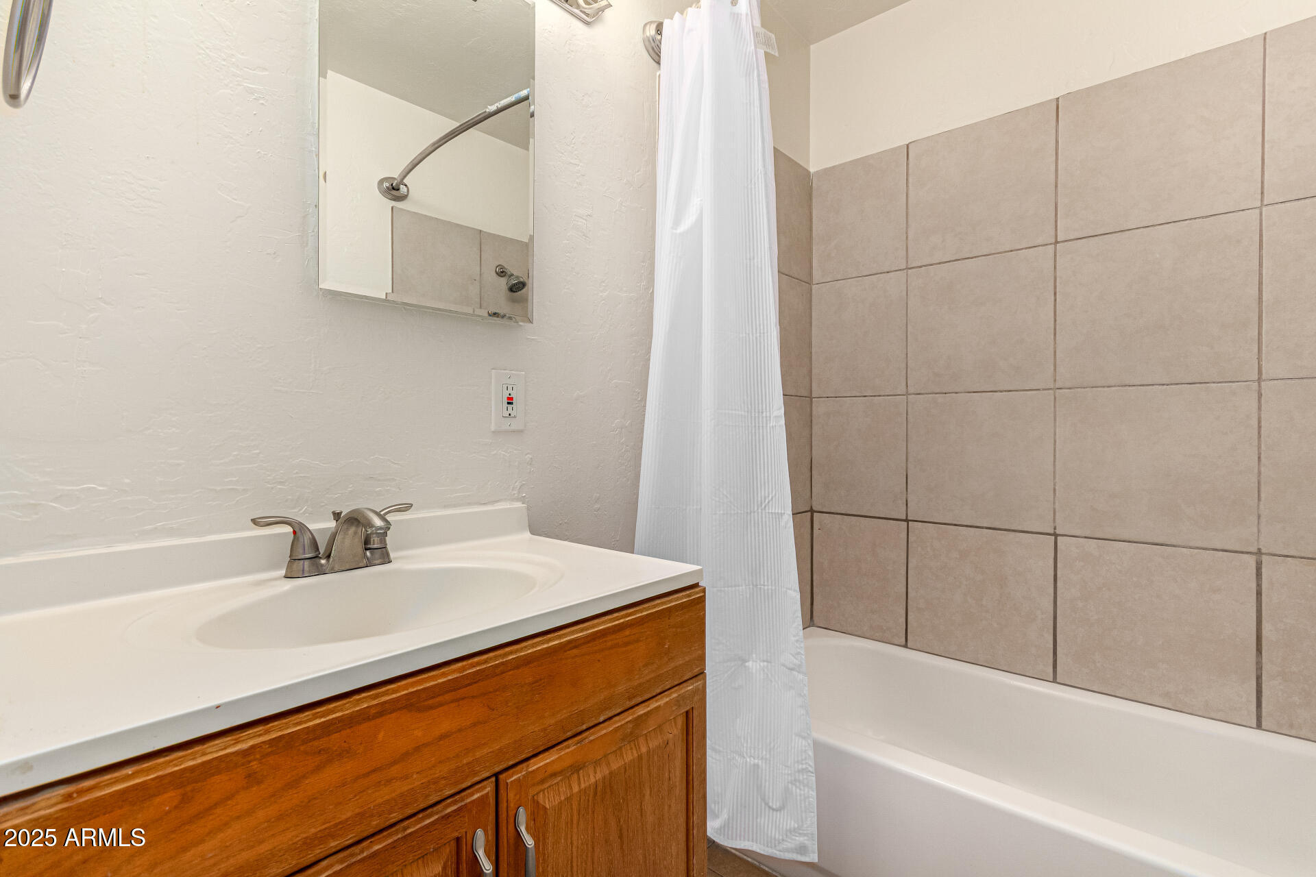1204 West 5th Street, Unit 8 Tempe, AZ 85281 - Photo 12 of 18 a bathroom with a sink and a bathtub