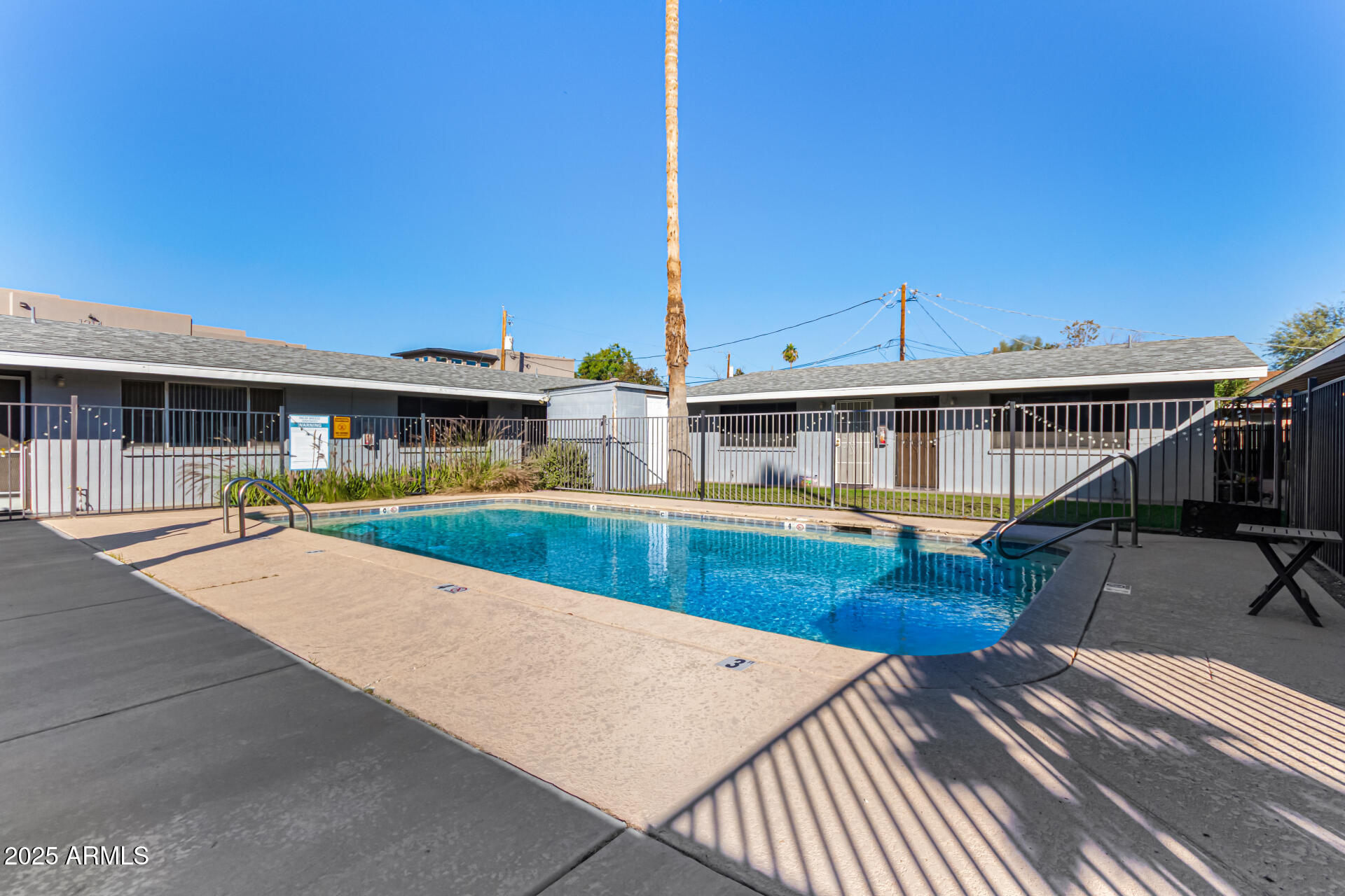 1204 West 5th Street, Unit 8 Tempe, AZ 85281 - Photo 17 of 18 a view of a house with swimming pool