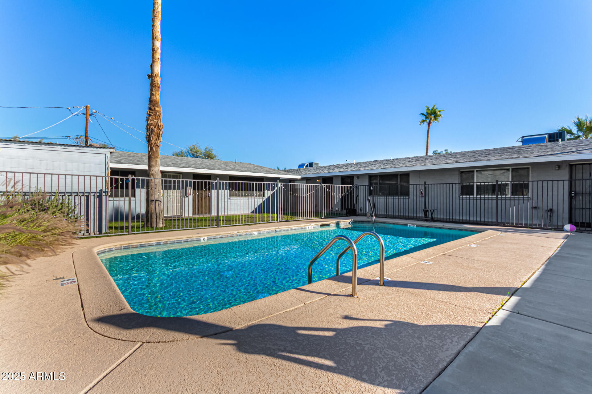 1204 West 5th Street, Unit 8 Tempe, AZ 85281 - Photo 18 of 18 a view of a house with pool