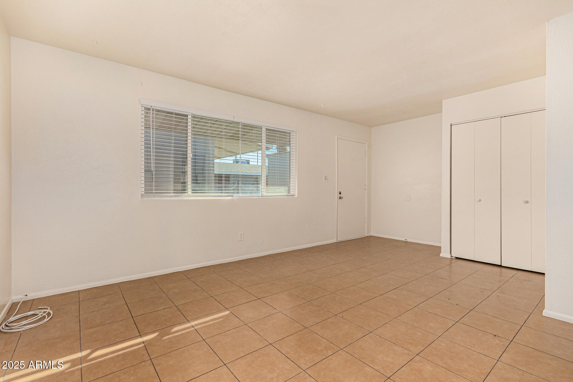 1204 West 5th Street, Unit 8 Tempe, AZ 85281 - Photo 2 of 18 an empty room with windows