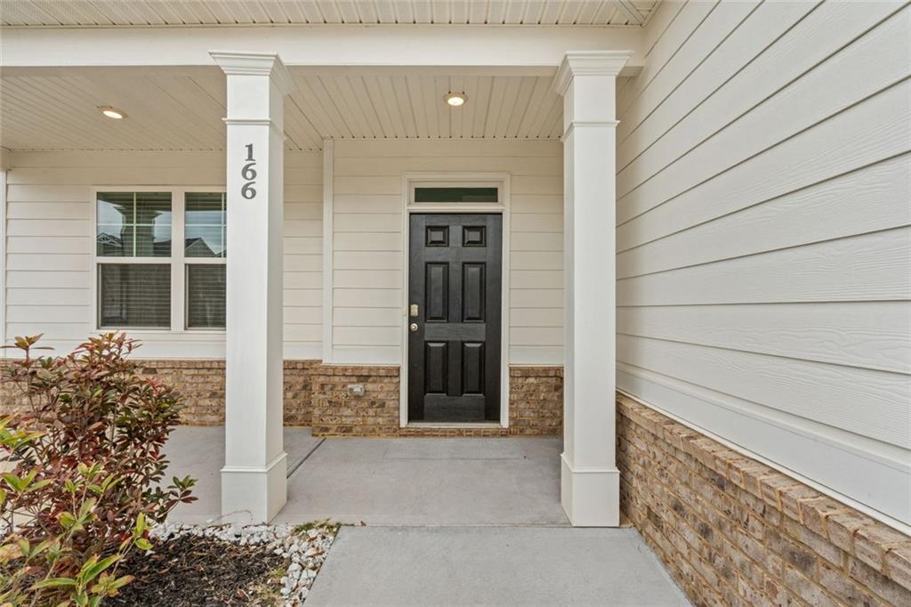 166 Champlain Road Hoschton, GA 30548 - Photo 2 of 53 a view of entryway of a house