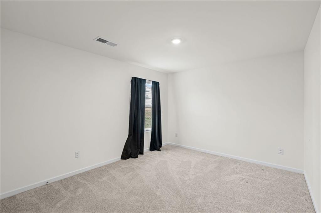 166 Champlain Road Hoschton, GA 30548 - Photo 36 of 53 a view of an empty room
