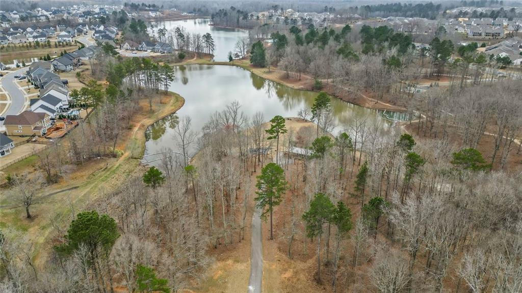 166 Champlain Road Hoschton, GA 30548 - Photo 49 of 53 a view of a lake with outdoor space