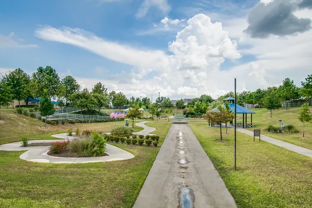 a view of a lake with a big yard