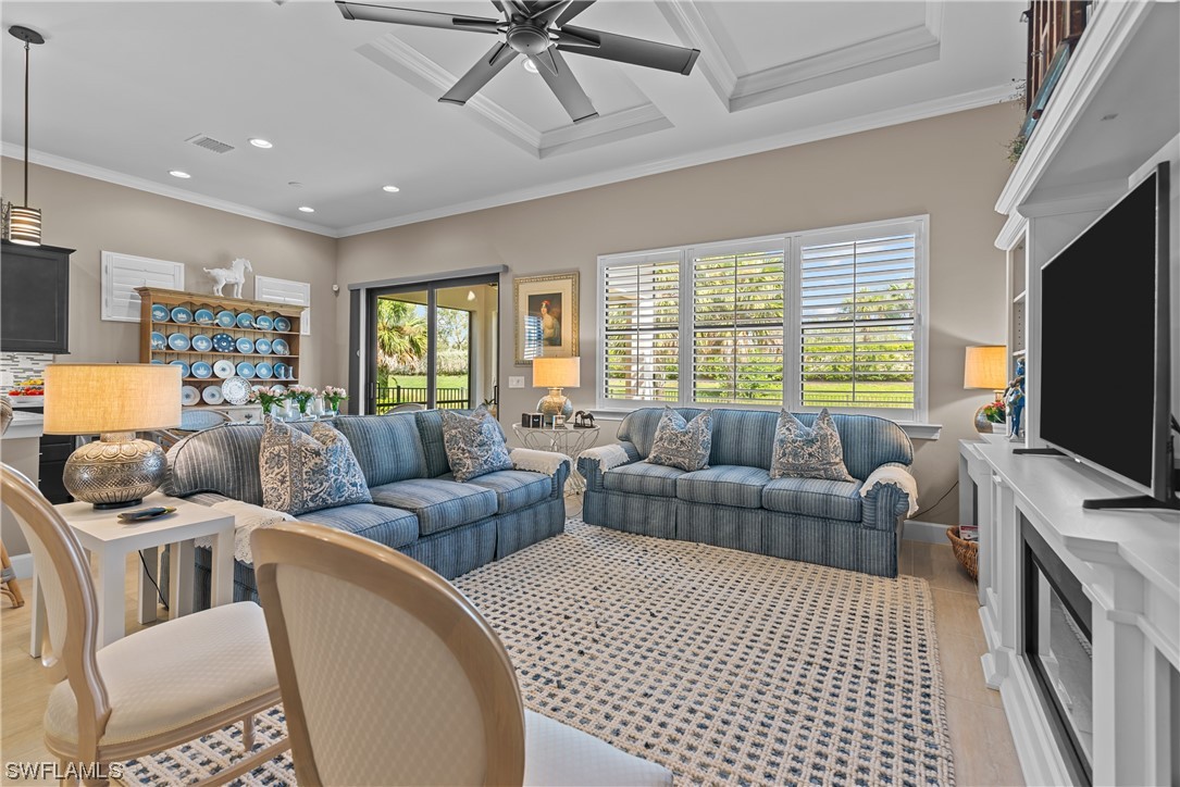 20198 Corkscrew Shores Boulevard Estero, FL 33928 - Photo 14 of 50 a living room with furniture and a flat screen tv