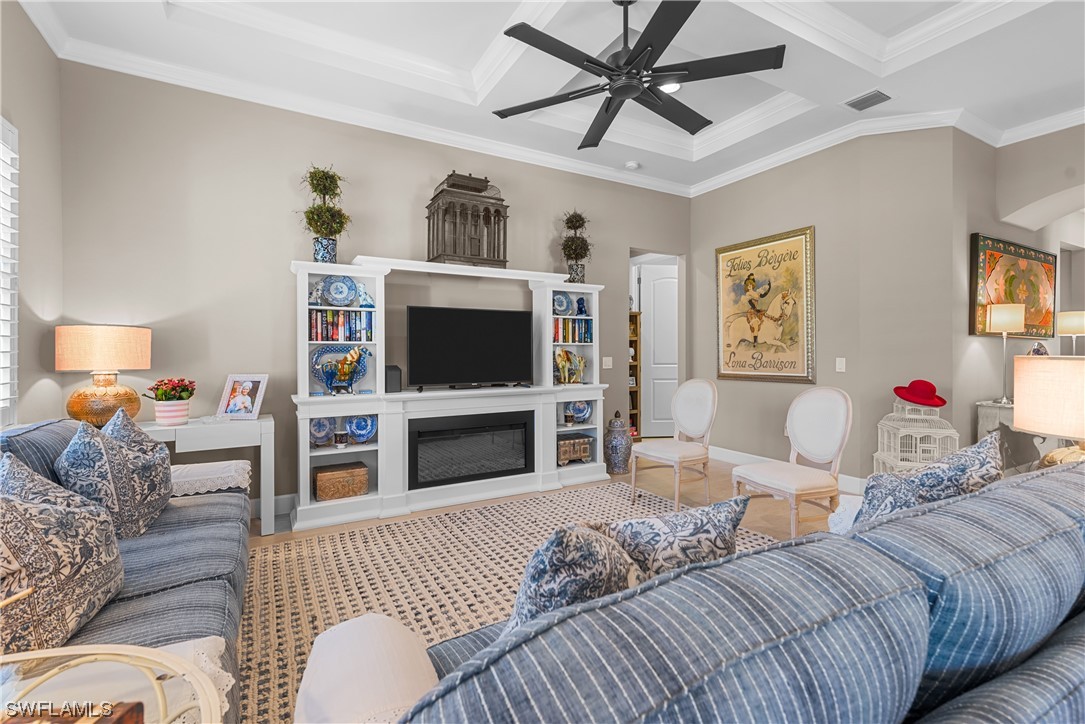 20198 Corkscrew Shores Boulevard Estero, FL 33928 - Photo 15 of 50 a living room with furniture a flat screen tv and a window