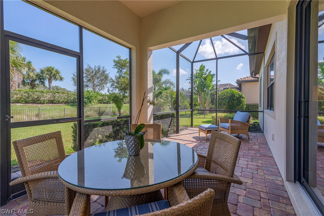 20198 Corkscrew Shores Boulevard Estero, FL 33928 - Photo 25 of 50 a view of a dining room with furniture window and outside view