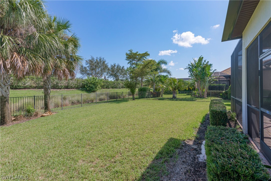 20198 Corkscrew Shores Boulevard Estero, FL 33928 - Photo 29 of 50 a view of a golf course with a lake