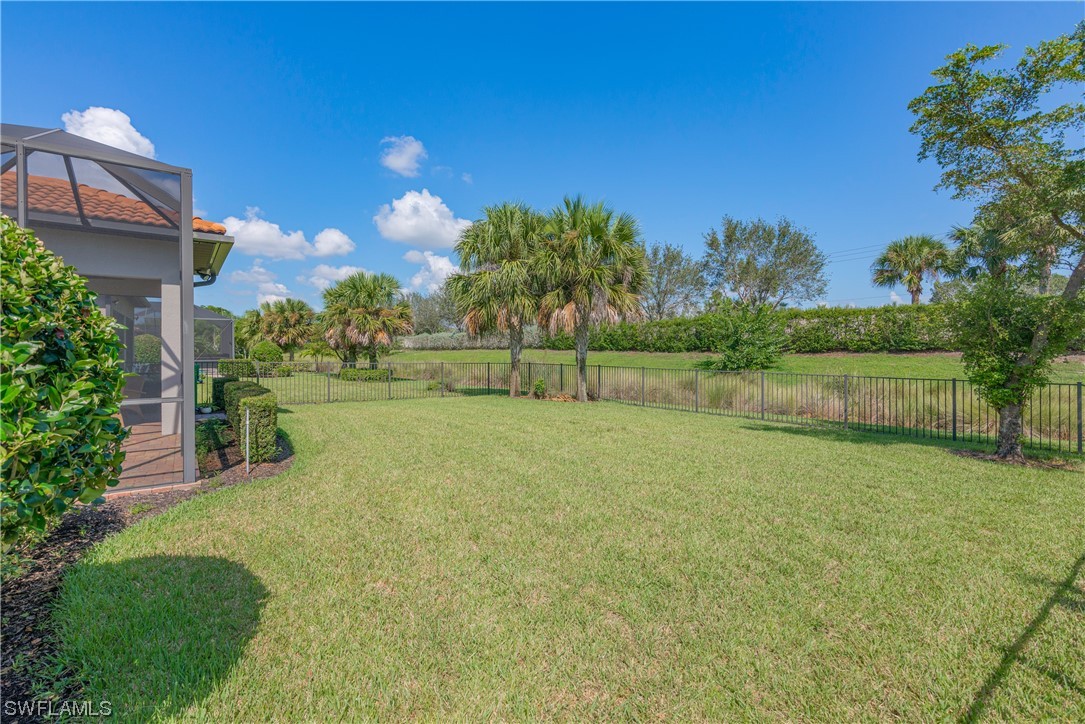 20198 Corkscrew Shores Boulevard Estero, FL 33928 - Photo 30 of 50 a view of a backyard