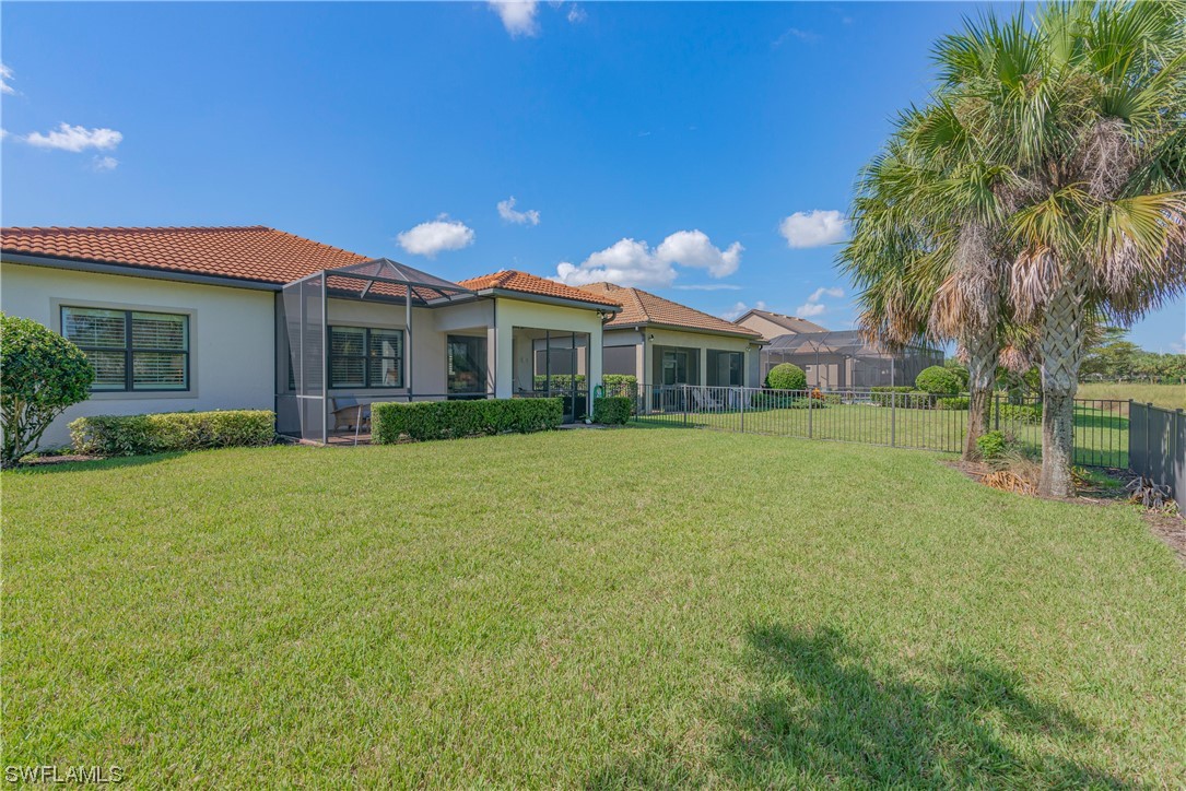 20198 Corkscrew Shores Boulevard Estero, FL 33928 - Photo 31 of 50 a front view of house with yard and green space
