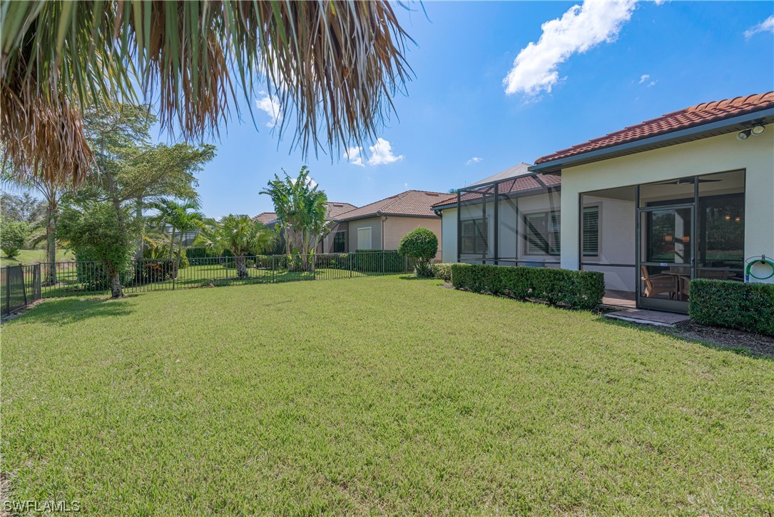 20198 Corkscrew Shores Boulevard Estero, FL 33928 - Photo 32 of 50 a view of a house with a garden