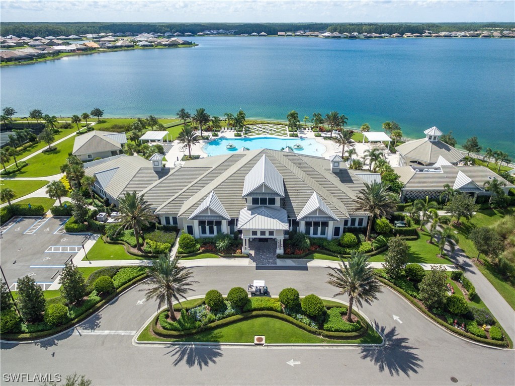20198 Corkscrew Shores Boulevard Estero, FL 33928 - Photo 35 of 50 a view of a house with outdoor space and ocean view